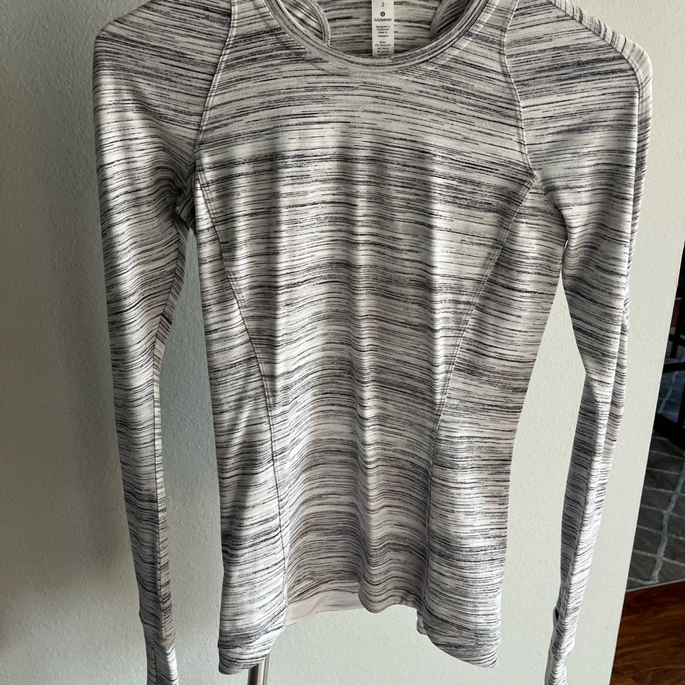 Lululemon long sleeve Hold Tight long sleeve shirt! NEVER WORN!